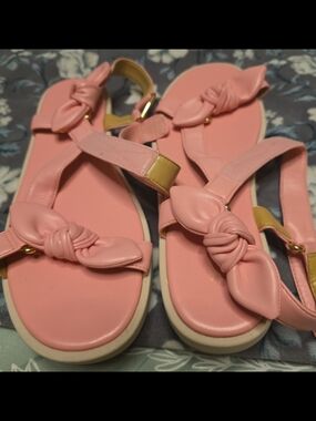 MICHAEL Kors Women’s Phoebe Sporty Strappy Bow Detail Sandal, Shell Pink, 9.5